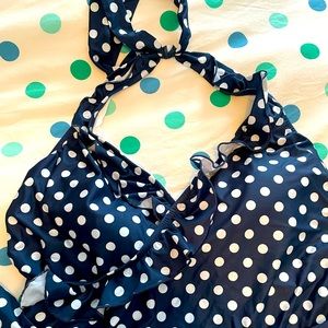 ModCloth one piece wrap halter neck bathing suit with waist tie.